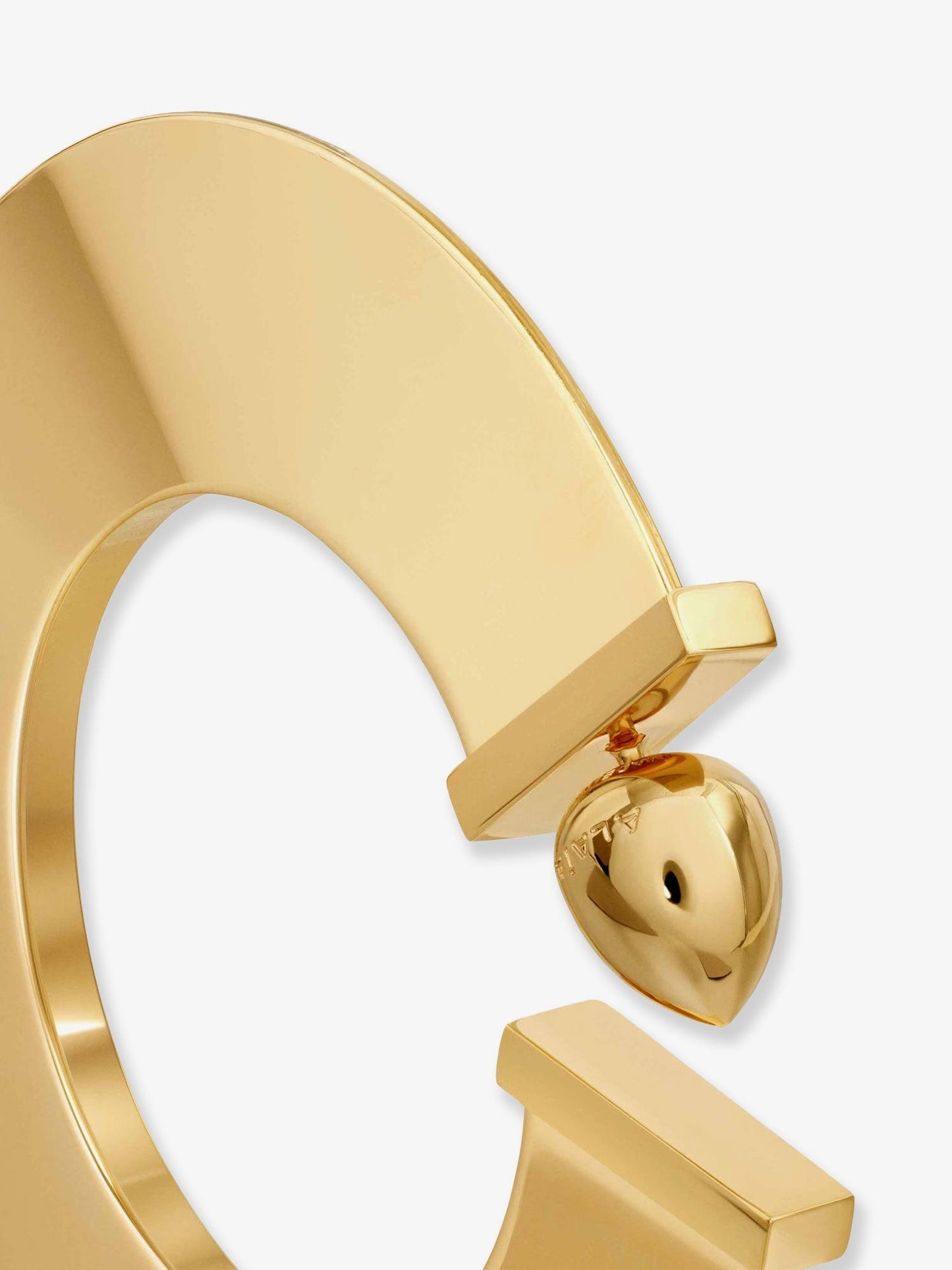 ALAIA Blade Hoop S earrings with Logo detail