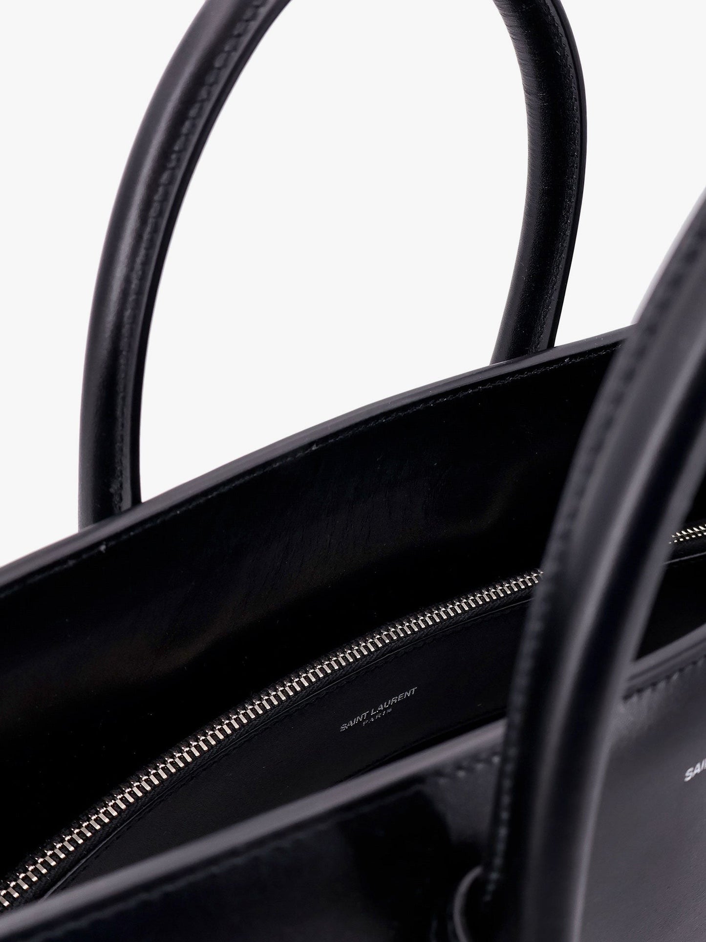 Saint Laurent Leather handbag with frontal logo print