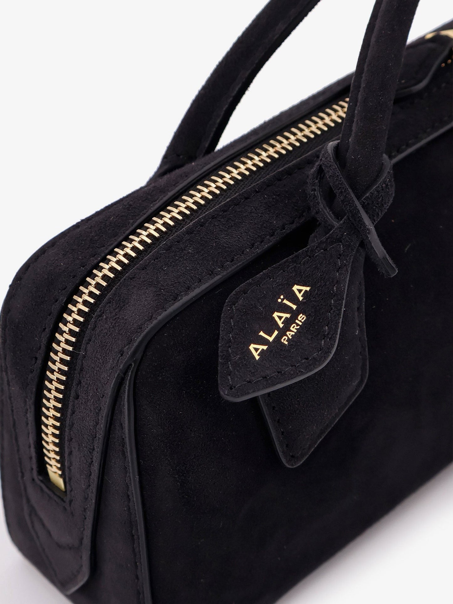 ALAIA Teckel Clutch suede handbag