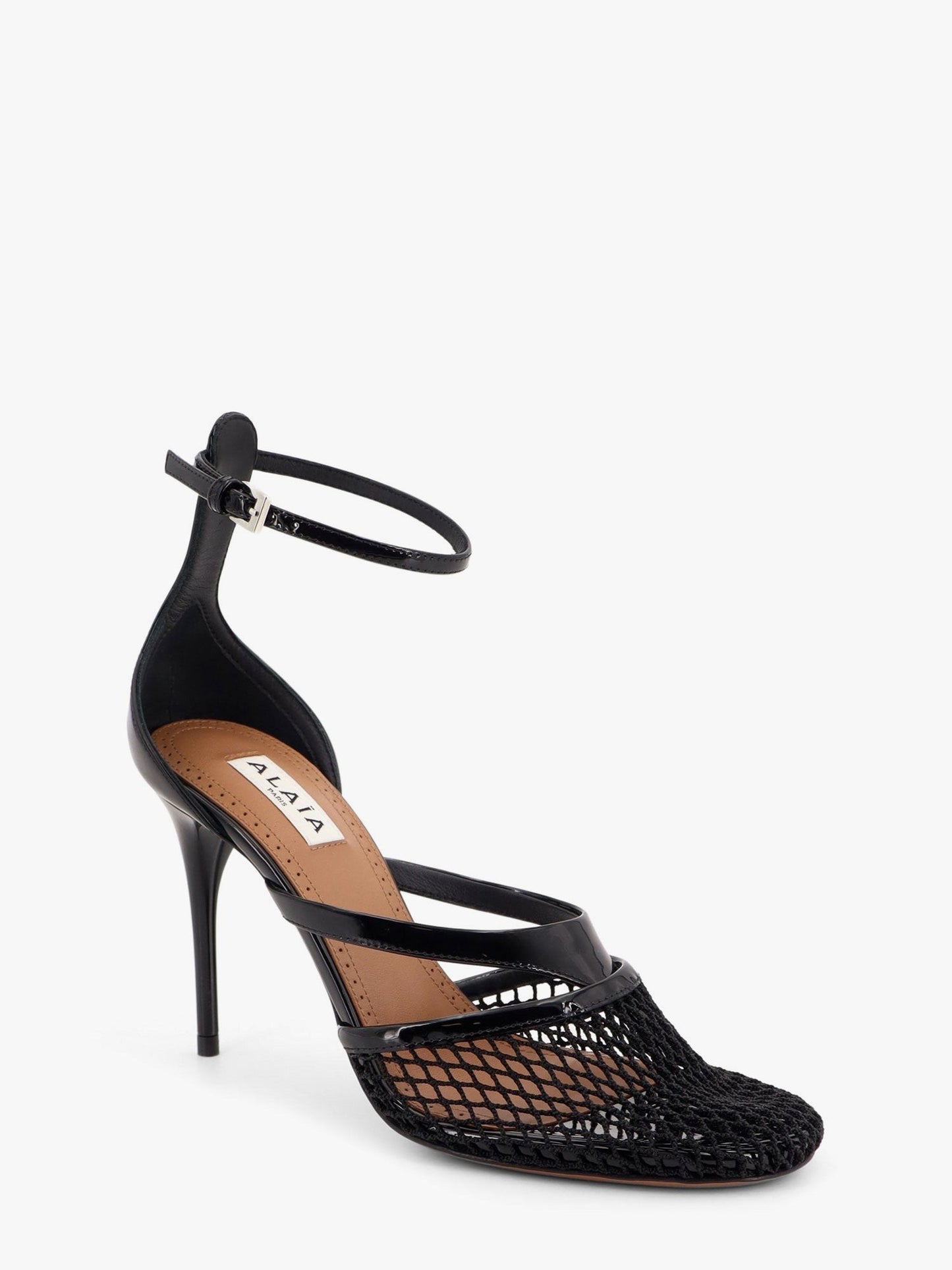 ALAIA Thong sandals in fishnet and patent leather