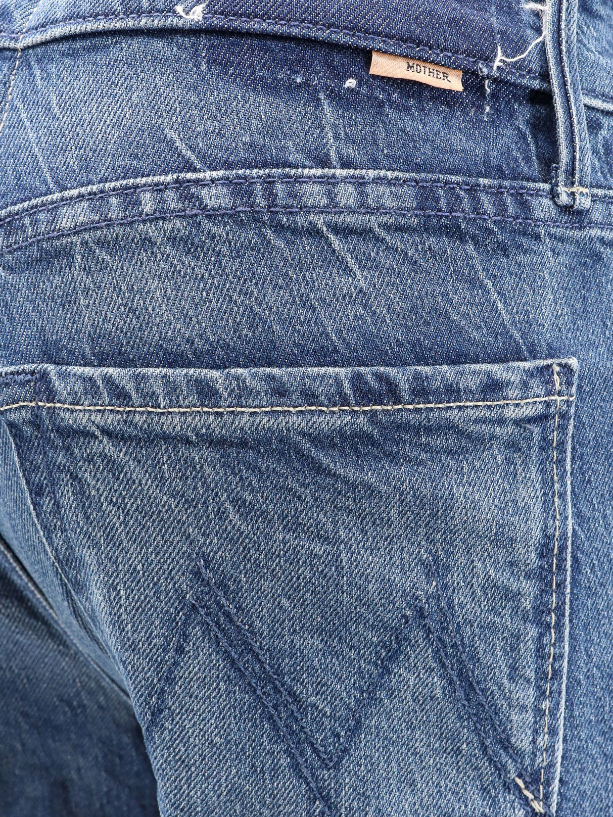 MOTHER Cotton blend jeans with embroidered monogram