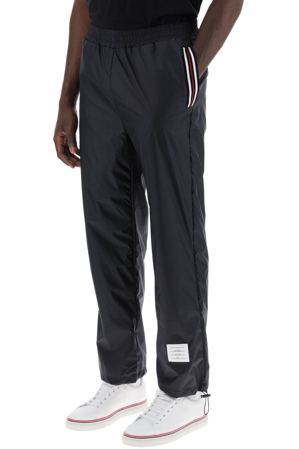 THOM BROWNE cricket stripe ripstop pants for