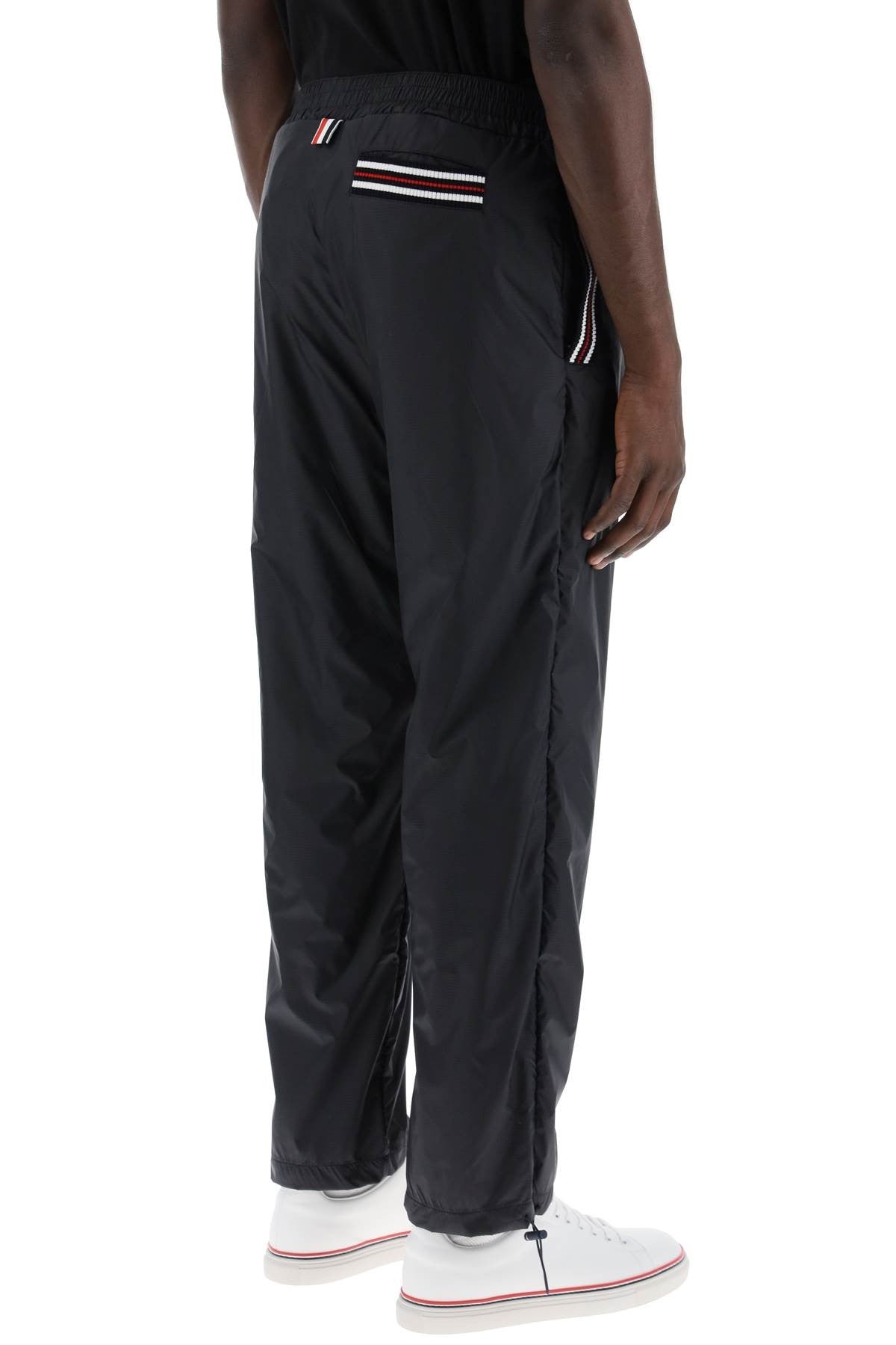 THOM BROWNE cricket stripe ripstop pants for