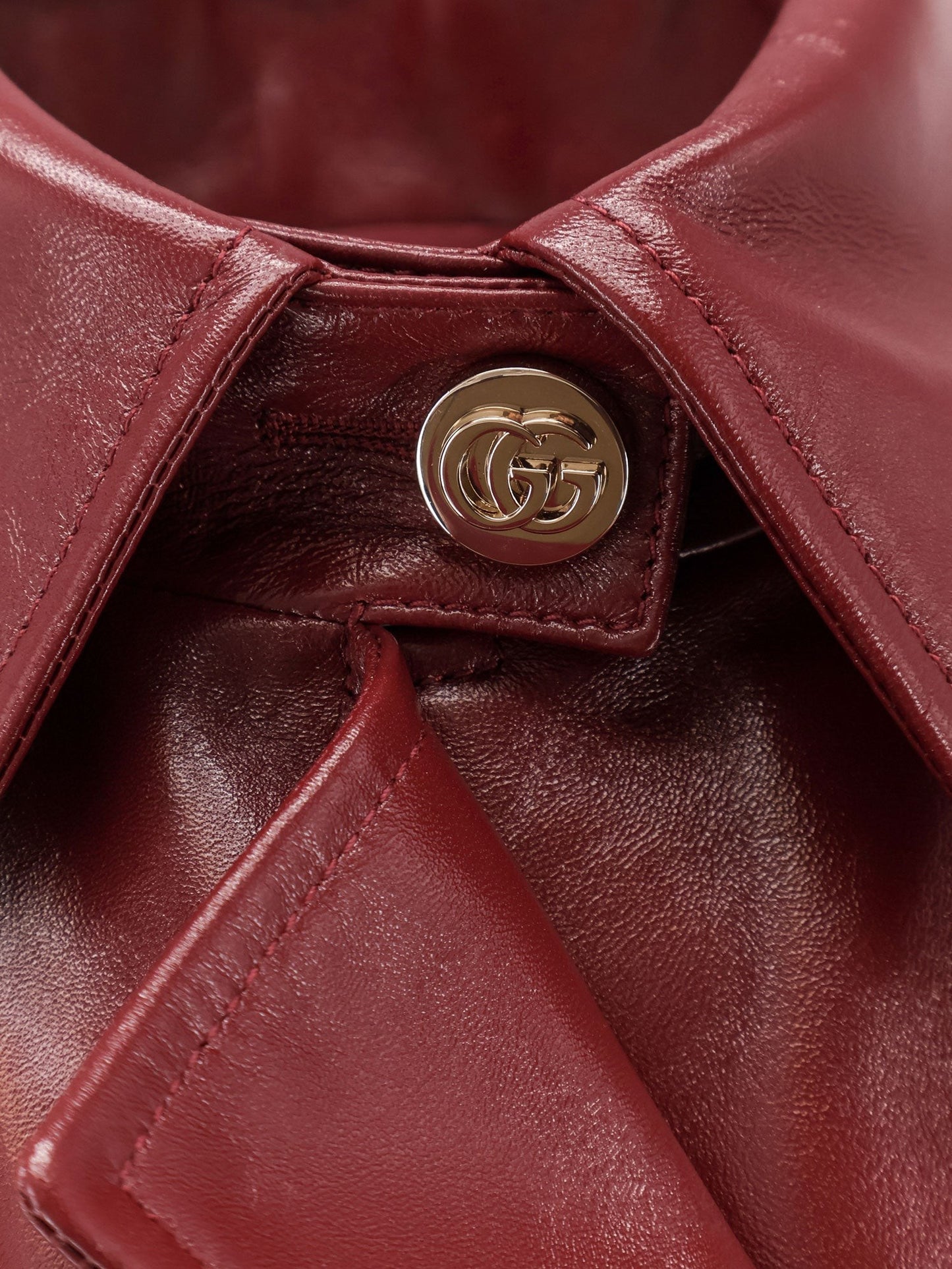 Gucci Double-breasted leather coat