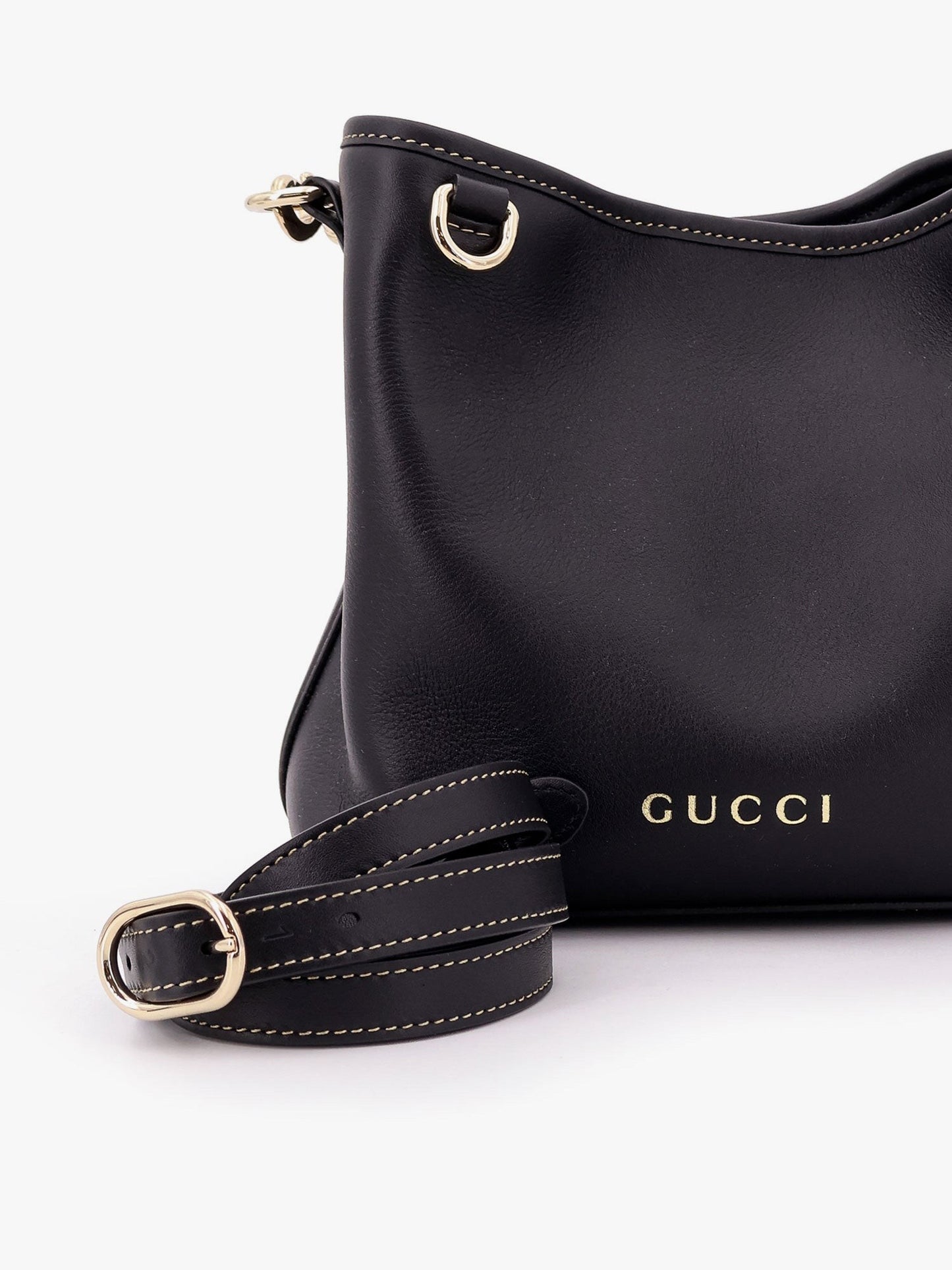 Gucci Gg emblem leather bucket bag with frontal logo