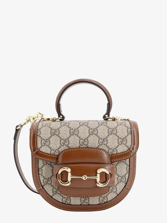 Gucci Gg supreme fabric and leather handbag with iconic horsebit