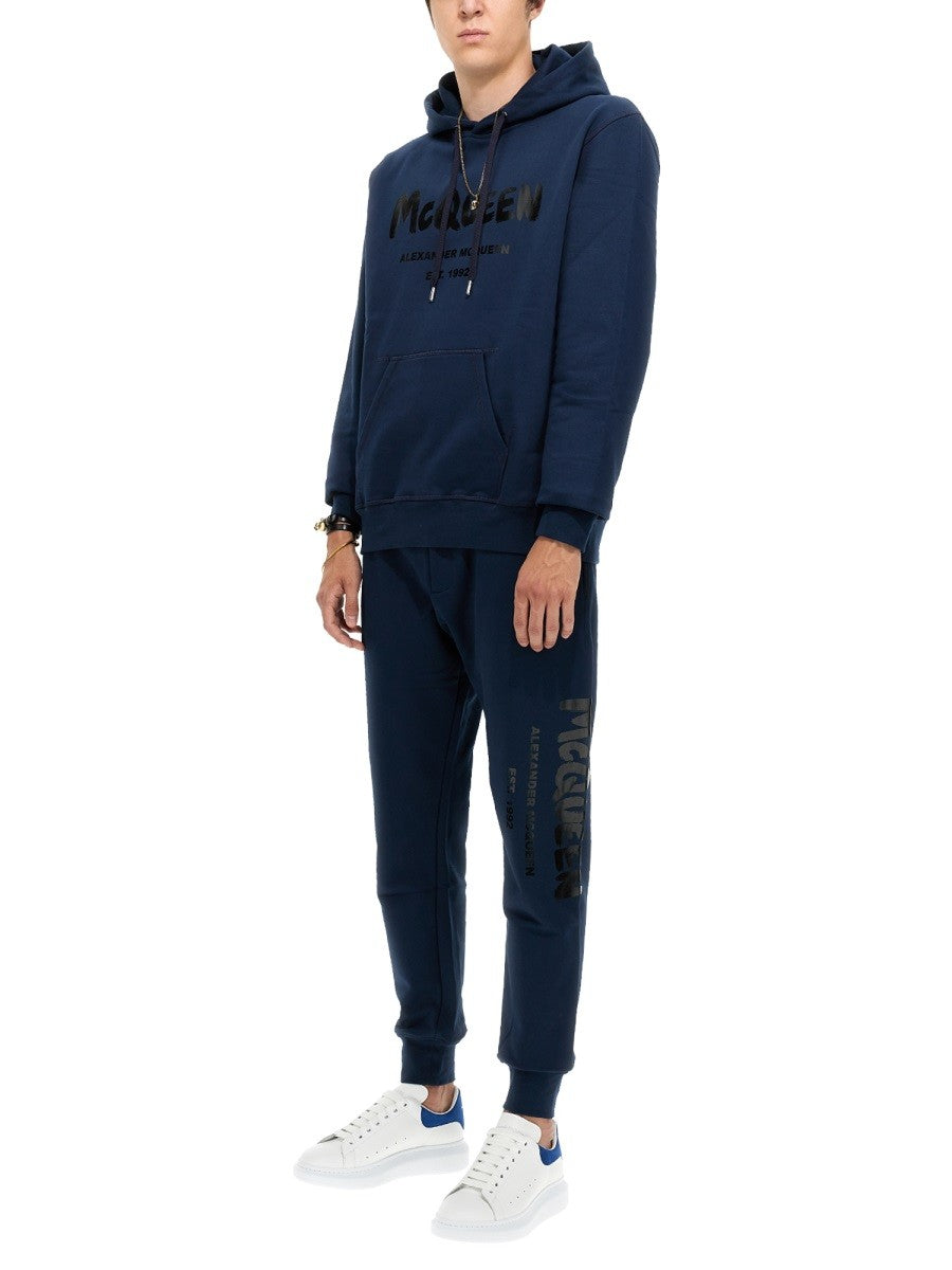 Alexander Mcqueen JOGGING PANTS WITH GRAFFITI LOGO