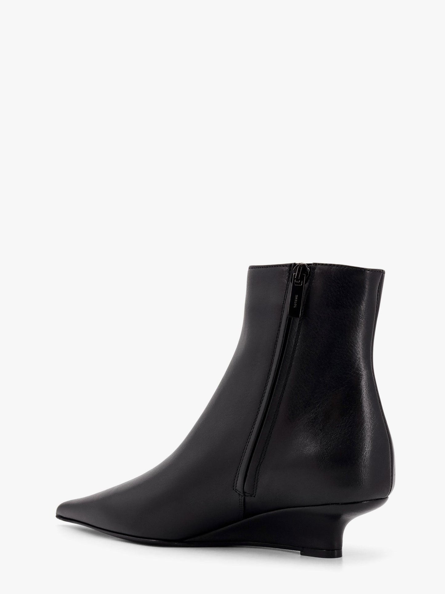 TOTEME Leather ankle boots with wedge heel