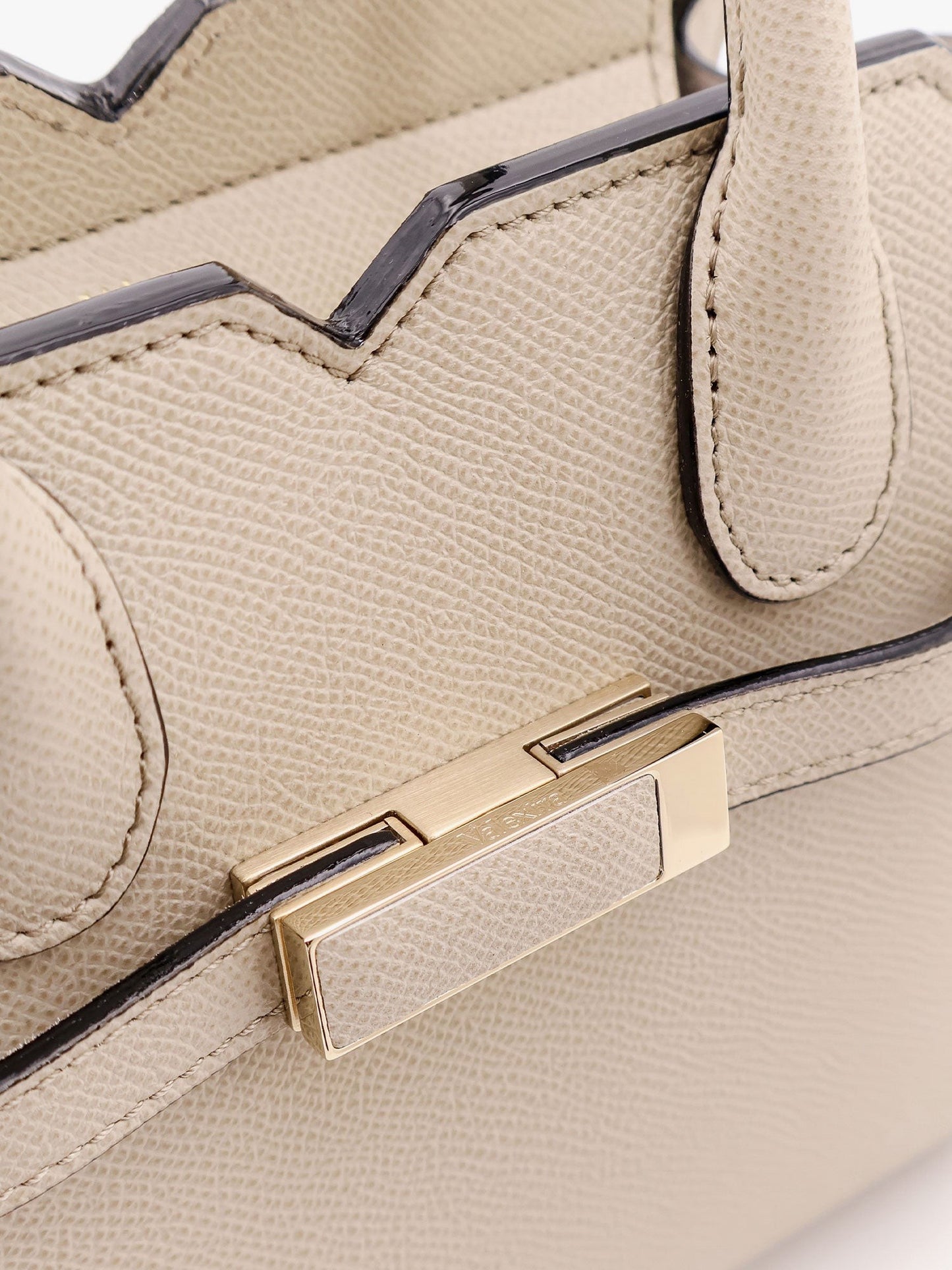 VALEXTRA Leather handbag with frontal walker and strap