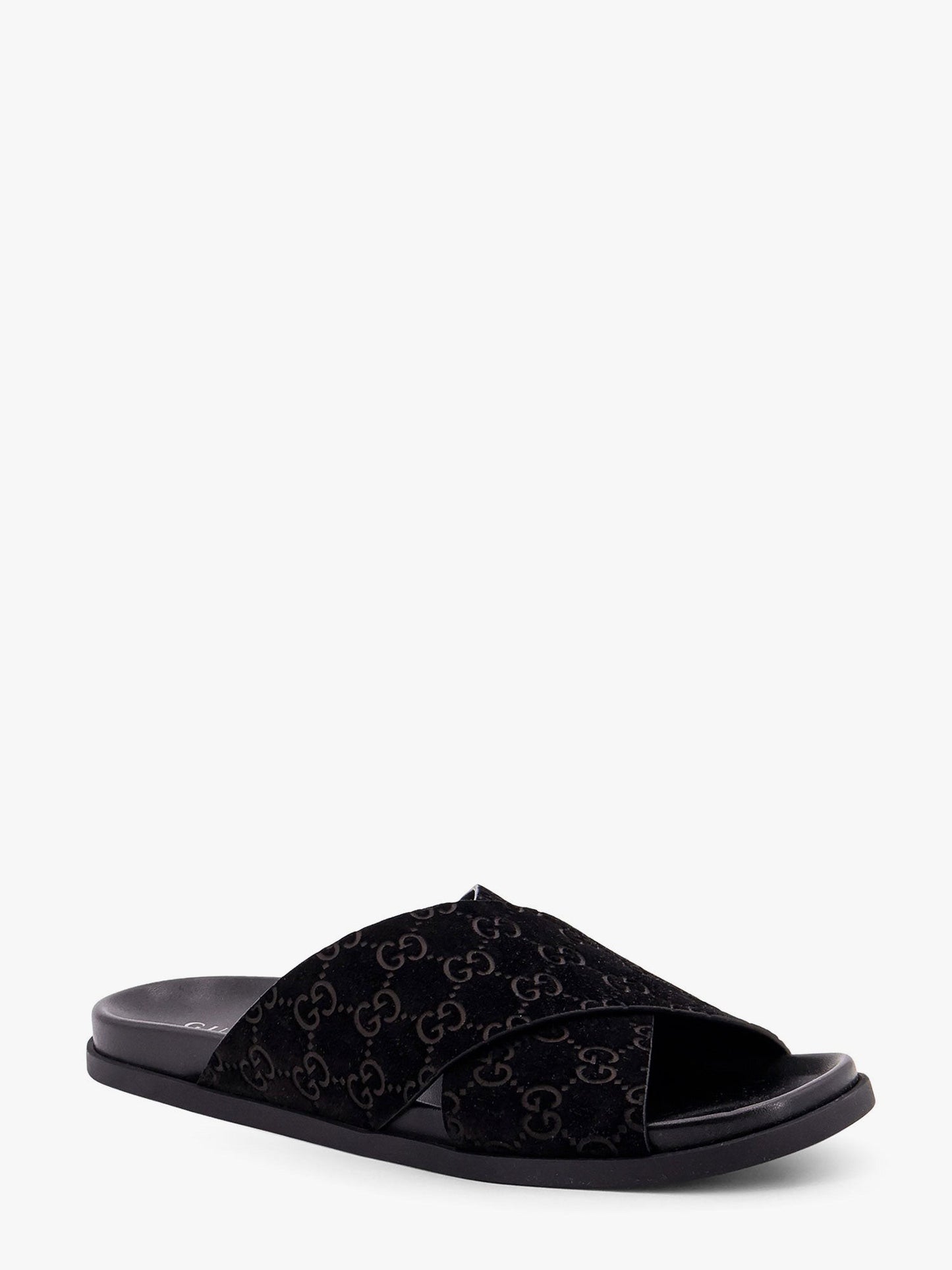 Gucci Leather slides with all-over GG motif