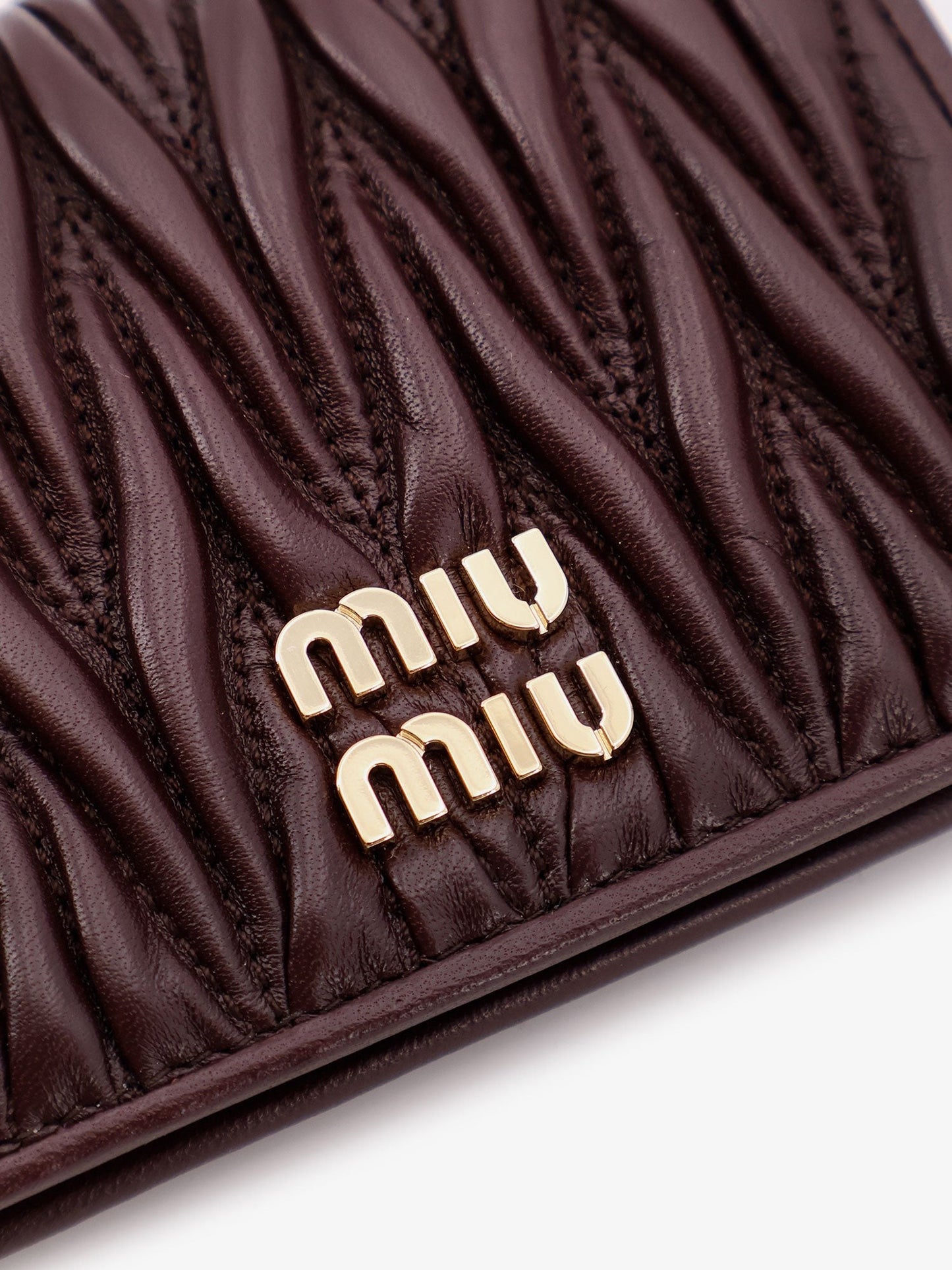 Miu Miu Matelassé leather wallet with metal logo