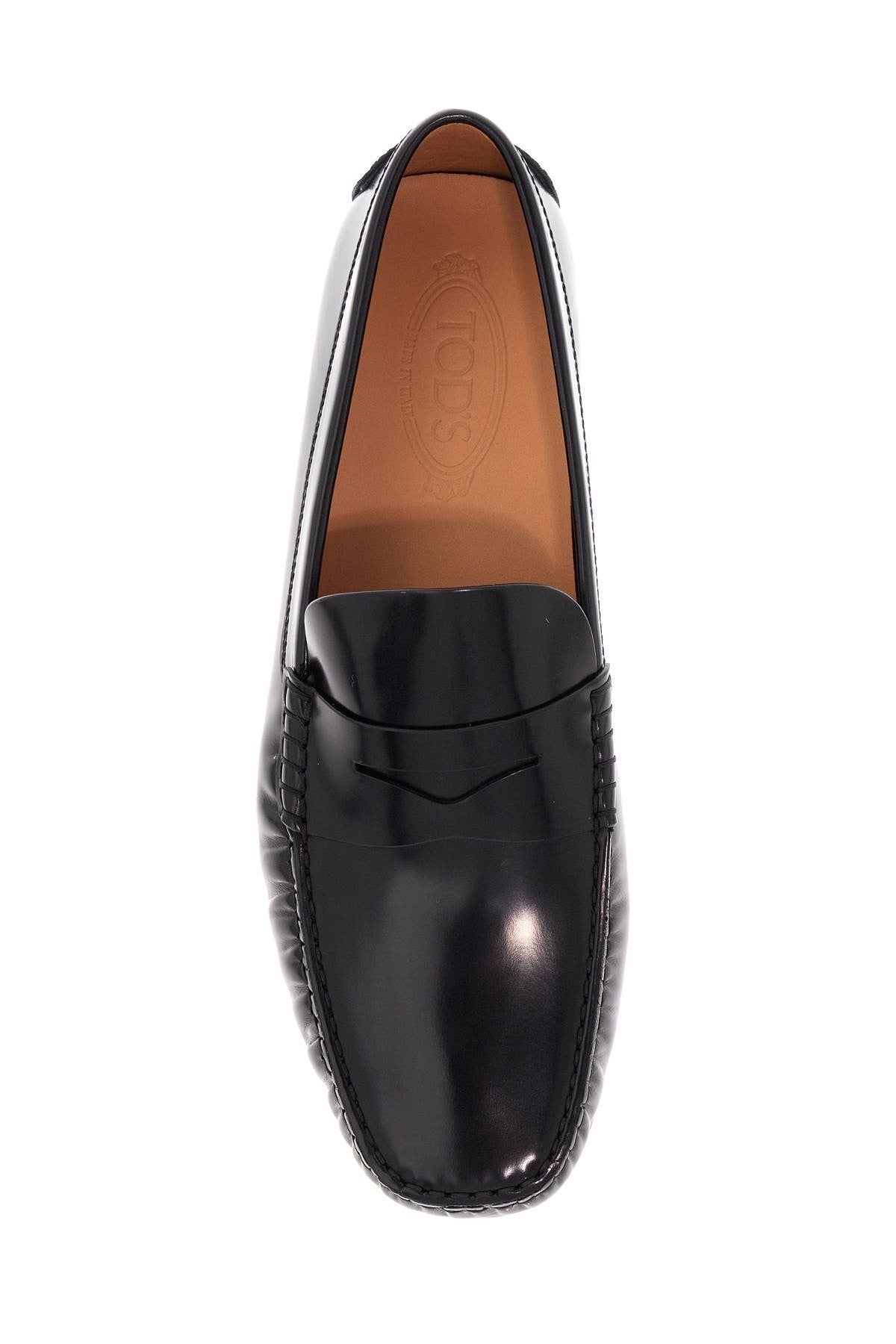 TOD'S men's black calfskin loafers with elegant insert and rubber sole