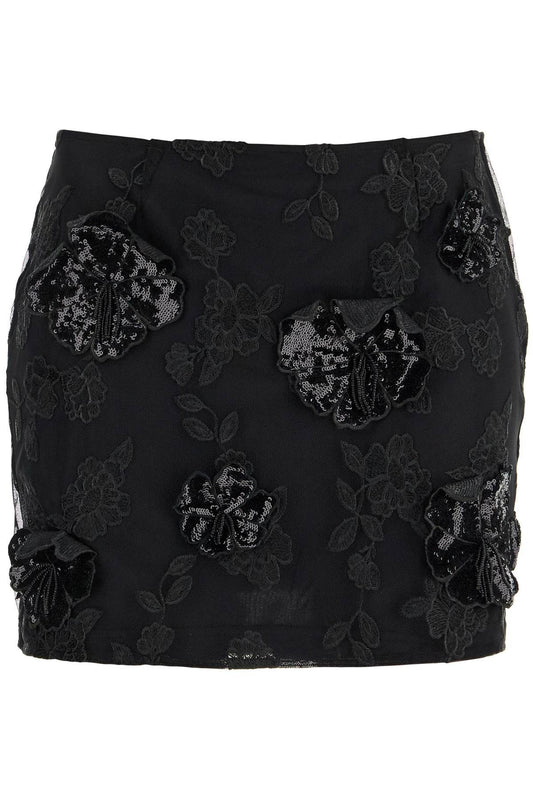 ROTATE mini skirt in recycled black polyester mesh with floral pattern