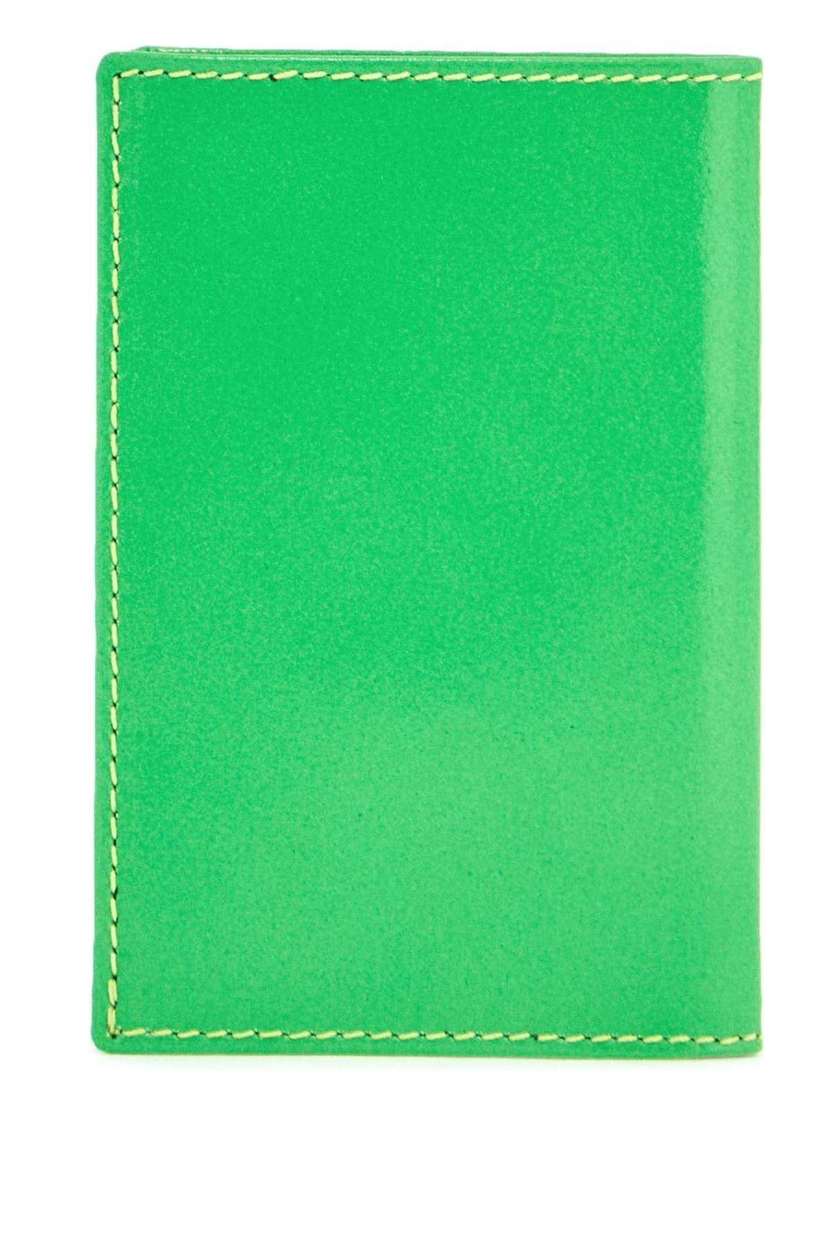 COMME DES GARCONS WALLET portafoglio compatto verde super fluo in pelle di capra