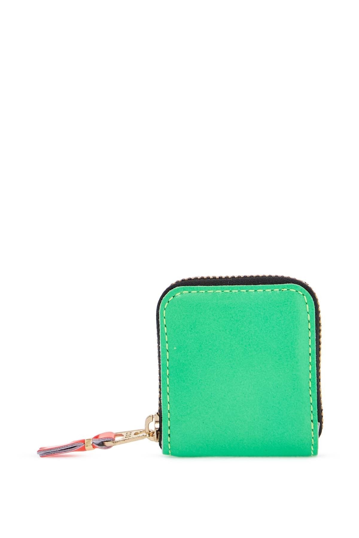 COMME DES GARCONS WALLET portafoglio unisex verde in pelle di capra con zip