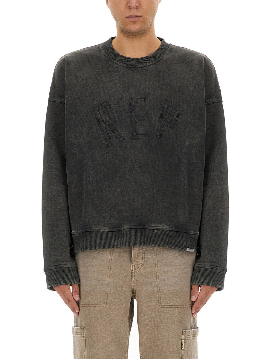 Represent "REP APPLIQUE" SWEATSHIRT