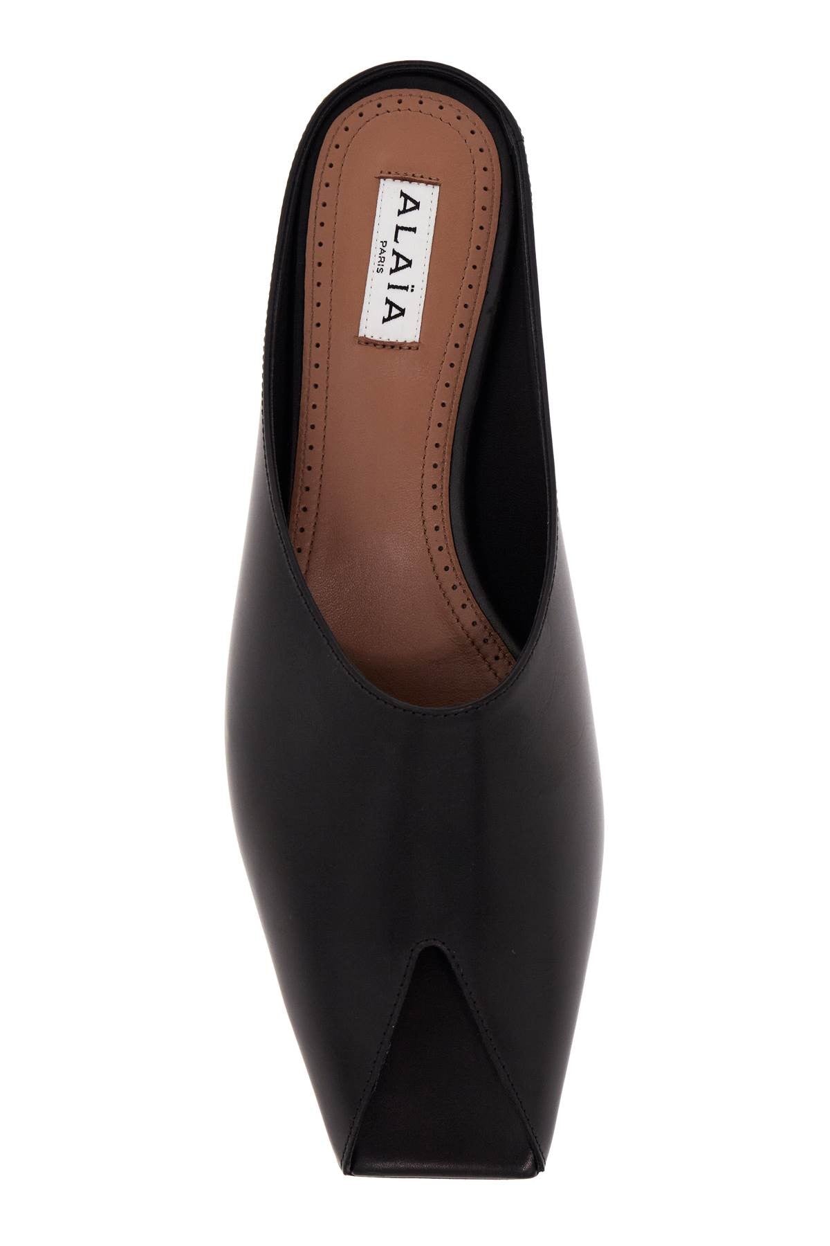 ALAIA spike flat mules