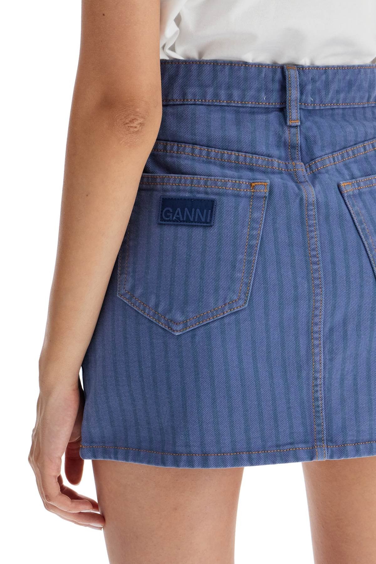 GANNI "striped overdyed denim mini