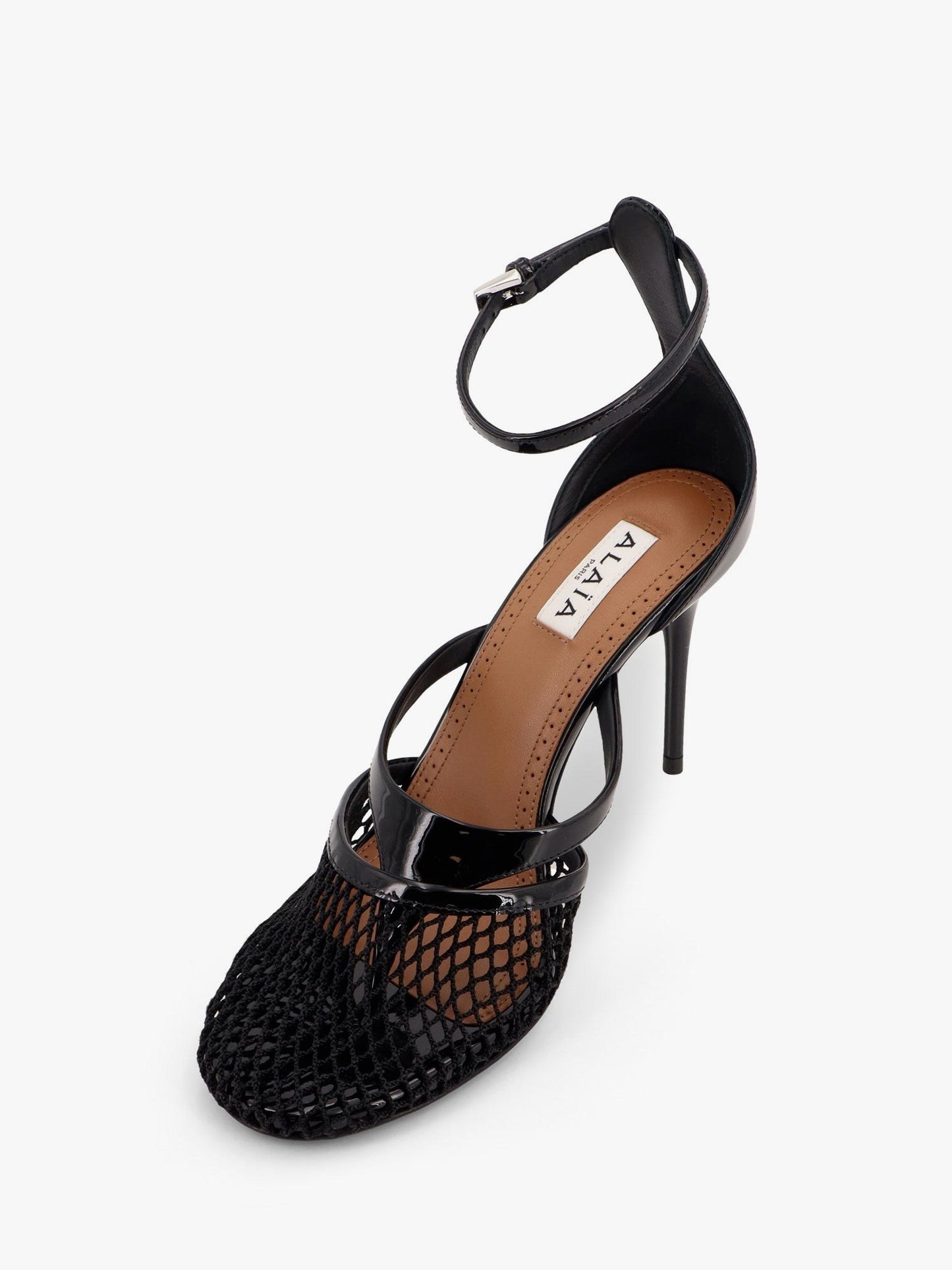 ALAIA Thong sandals in fishnet and patent leather