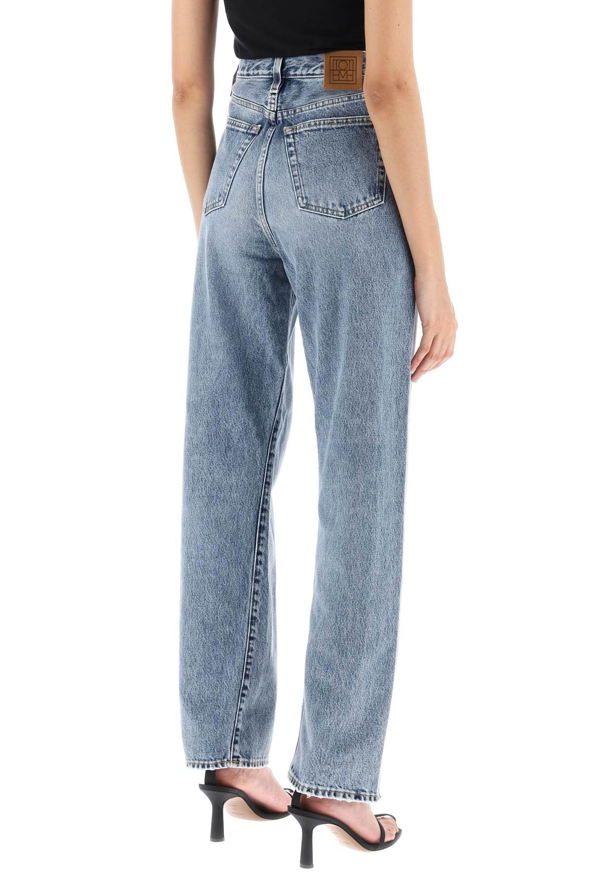 TOTEME twisted seam straight jeans