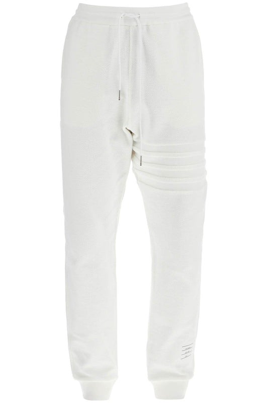 THOM BROWNE white cotton sweatpants with 4 stripes