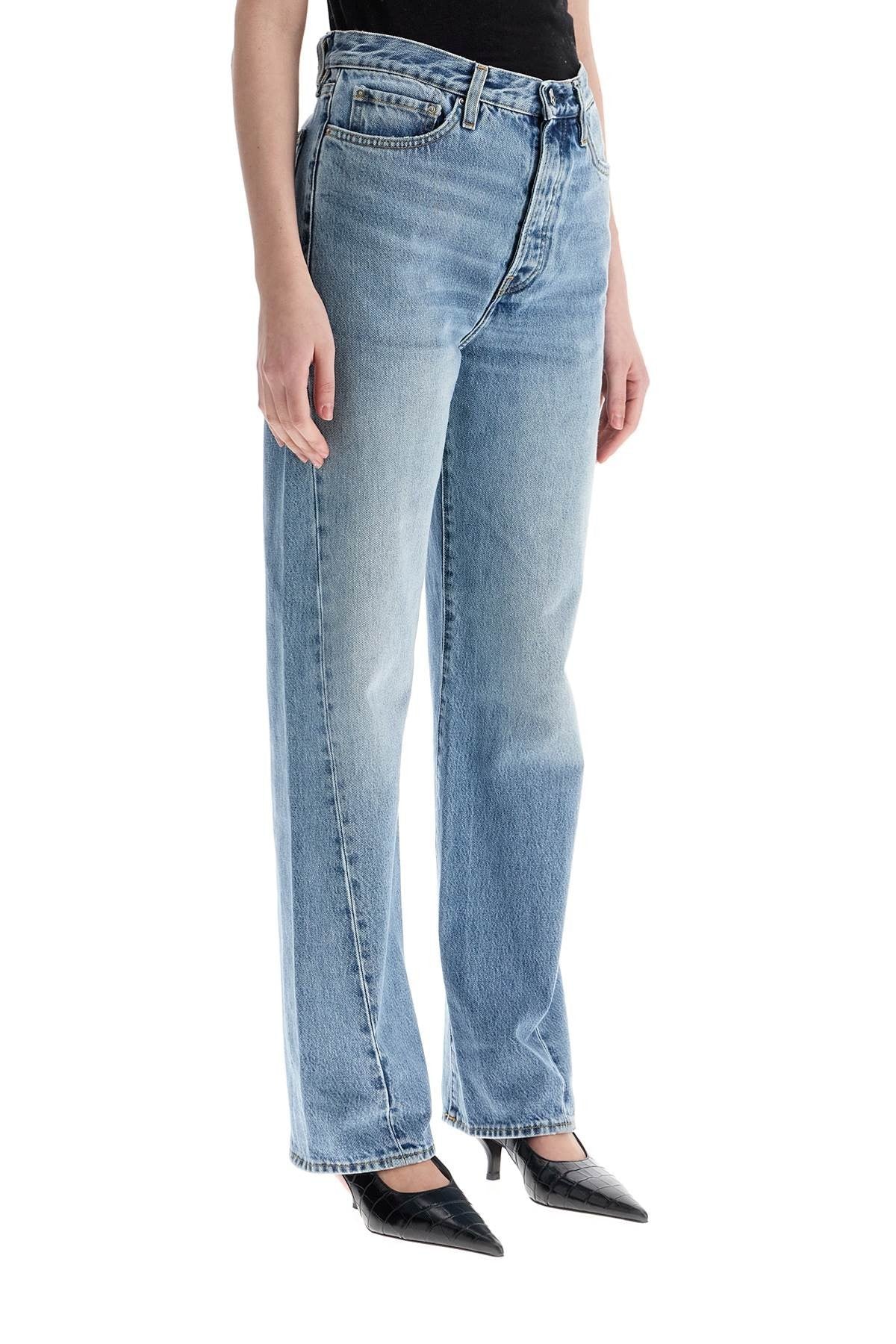 TOTEME wide leg organic cotton jeans in worn blue with twisted seams